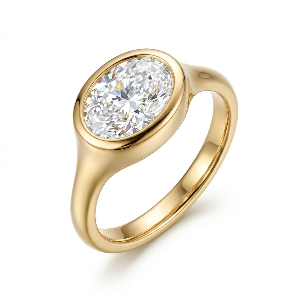 Oval Bezel Set Diamond Ring with Smooth Gold Band
